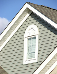 Upper level of a home with vinyl siding