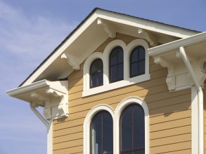 Arched windows on a two-story home