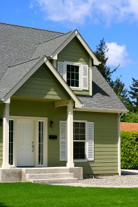 Suburban home with green polymer siding